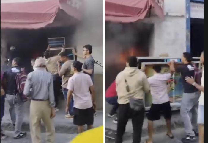 EN VIDEO: Incendio por poco acaba con local de venta de bafles